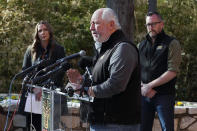Gregg Hudson, center, executive director and CEO of Dallas Zoo Management, Inc., responds to questions during a news conference at the zoo as Dallas Police Department spokesperson Kristin Lowman, left, and Harrison Adell, right, executive vice president of animal care and conservation for the zoo, looks on, Friday, Feb. 3, 2023, in Dallas. (AP Photo/Tony Gutierrez)
