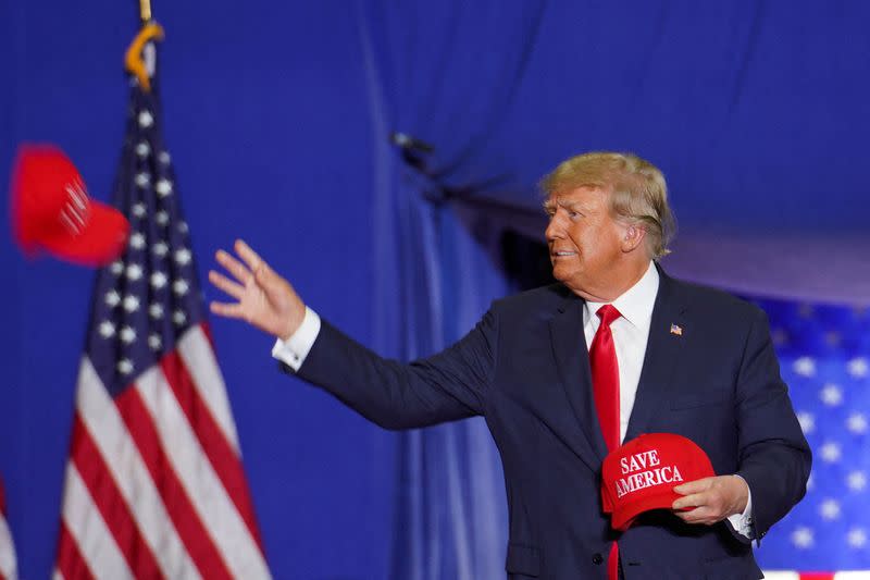 FILE PHOTO: Former U.S. president Donald Trump holds a rally in Warren, Michigan