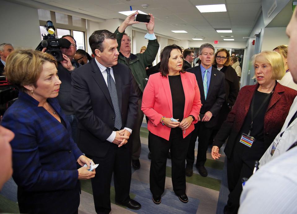 Sue Joss, right, CEO of the Brockton Neighborhood Health Center, talks about the health center's new pharmacy which is expected to open in a few weeks, with, from left, Gov. Maura Healey, Mayor Robert Sullivan and Lt. Gov. Kim Driscoll, on Thursday, March 2, 2023.