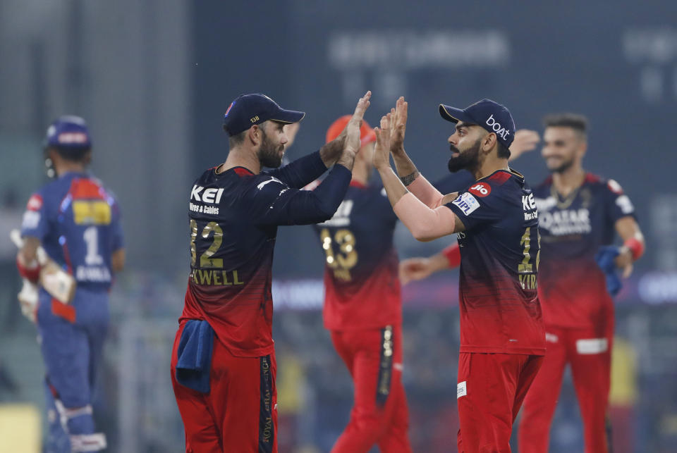 Royal Challengers Bangalore players celebrate after wining against Lucknow Super Giants during the Indian Premier League (IPL) cricket match in Lucknow, India, Monday, May 1, 2023. (AP Photo/Surjeet Yadav)