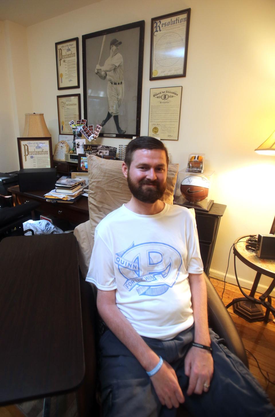 Pat Quinn, 33, of Yonkers was one of the key people to make the Ice Bucket Challenge go viral two years ago. Quinn, photographed at home Aug. 5, 2016, was diagnosed with ALS, also known as Lou Gehrig's disease, in 2013. A photo of Gehrig hangs behind him in his apartment.