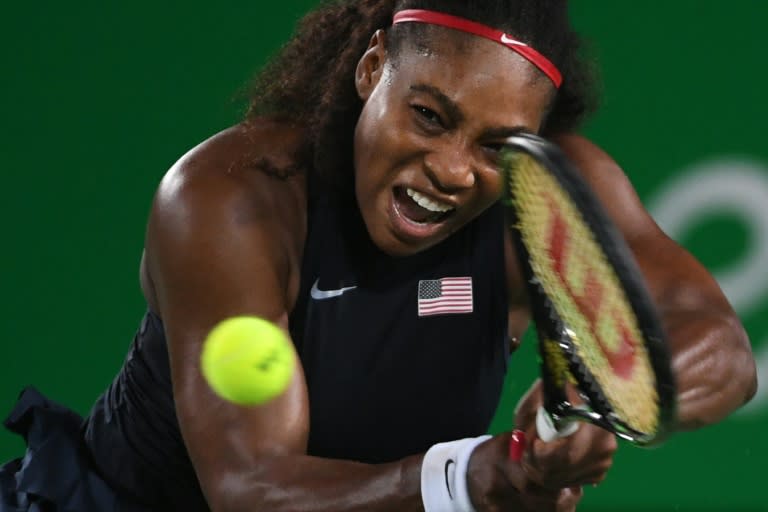 Serena Williams of the US hits a return to France's Alize Cornet during their second round singles match, at the Rio 2016 Olympic Games, on August 8