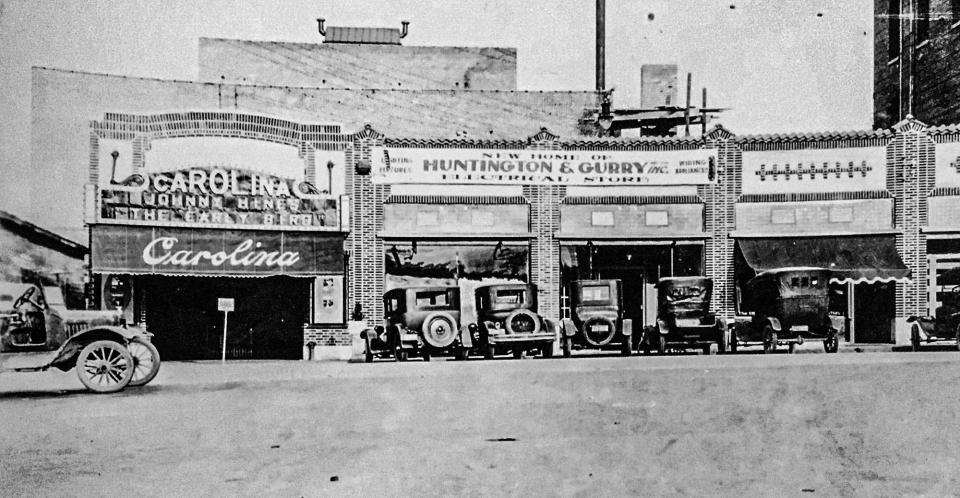Carolina Theater in Greenville, around 1925. Johnny Hines in "The Early Bird", feature presentation, next door to Huntington & Gurry Electrical Store.
