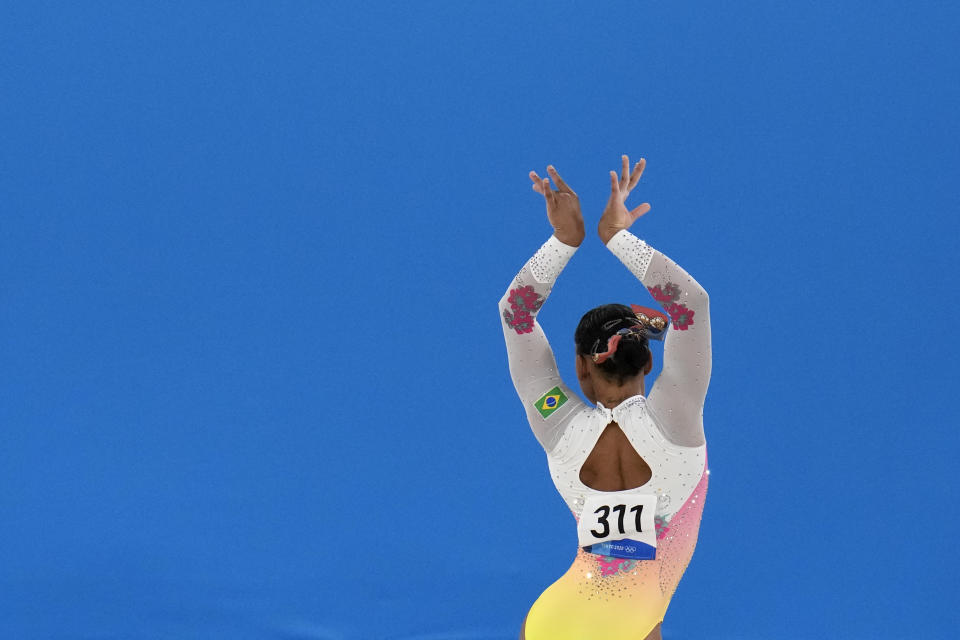 Rebeca Andrade, of Brazil, performs on the floor during the artistic gymnastics women's apparatus final at the 2020 Summer Olympics, Monday, Aug. 2, 2021, in Tokyo, Japan. (AP Photo/Gregory Bull)