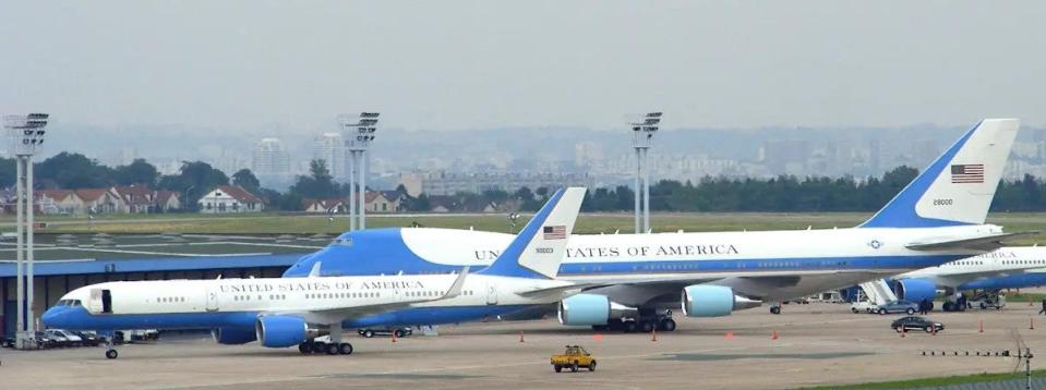 A C-32A aircraft, in front, together with a VC-25A Air Force One jet at Paris Orly Airport in France in 2009. <em>Mathieu Marquer via Wikimedia </em>