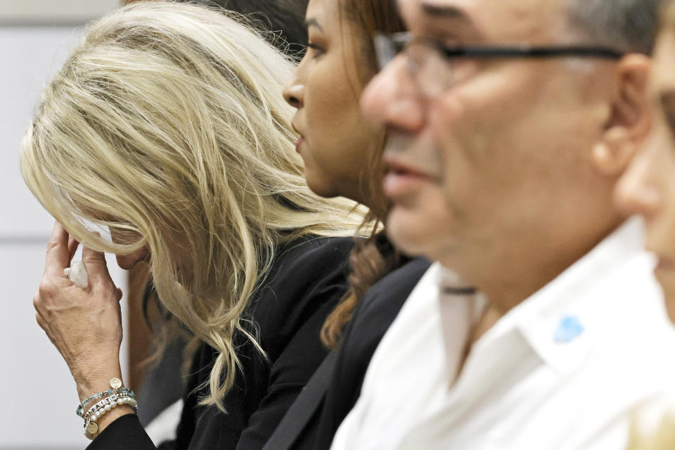 Gena Hoyer reacts as she hears that her son's murderer will not receive the death penalty as the verdicts are announced in the trial of Marjory Stoneman Douglas High School shooter Nikolas Cruz at the Broward County Courthouse, in Fort Lauderdale, Fla., on Oct. 13, 2022,  Hoyers son, Luke, was killed in the 2018 shootings. Cruz, who plead guilty to 17 counts of premeditated murder in the 2018 shootings, is the most lethal mass shooter to stand trial in the U.S. He was previously sentenced to 17 consecutive life sentences without the possibility of parole for 17 additional counts of attempted murder for the students he injured that day. (Amy Beth Bennett / Pool via Getty Images)
