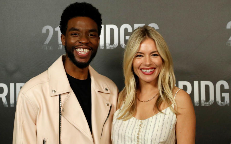 Sienna Miller honors her 21 Bridges co-star Chadwick Boseman after his untimely passing. 