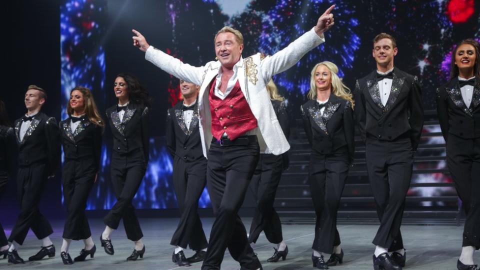 Michael Flatley with Lord of the Dance cast