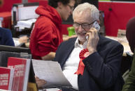 Labour leader Jeremy Corbyn joins a phone banking session with party activists at the Scottish Labour Party headquarters in Glasgow, Scotland Tuesday Dec. 10, 2019 while on the General Election campaign trail. Britain goes to the polls on Dec. 12. (Jane Barlow/PA via AP)