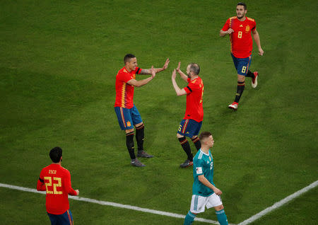 Soccer Football - International Friendly - Germany vs Spain - ESPRIT arena, Dusseldorf, Germany - March 23, 2018 Spain’s Rodrigo celebrates with Andres Iniesta after scoring their first goal REUTERS/Wolfgang Rattay