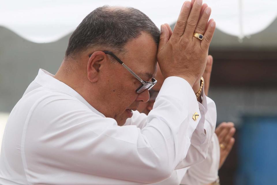 Mahinda Samarasinghe, Sri Lanka’s ambassador to the U.S., prays during the ceremony.