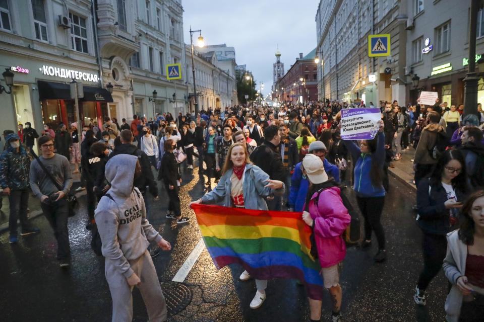 FILE – LGBTQ+ activists hold a rainbow flag at a rally in Pushkin Square, in Moscow, Russia, on Wednesday, July 15, 2020. The crackdown on LGBTQ+ rights has gone on for more than a decade under President Vladimir Putin. (AP Photo, File)