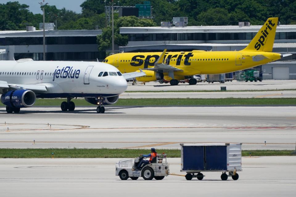 A Spirit Airlines flight from Jamaica to Florida became a site of chaos on Sunday (AP)