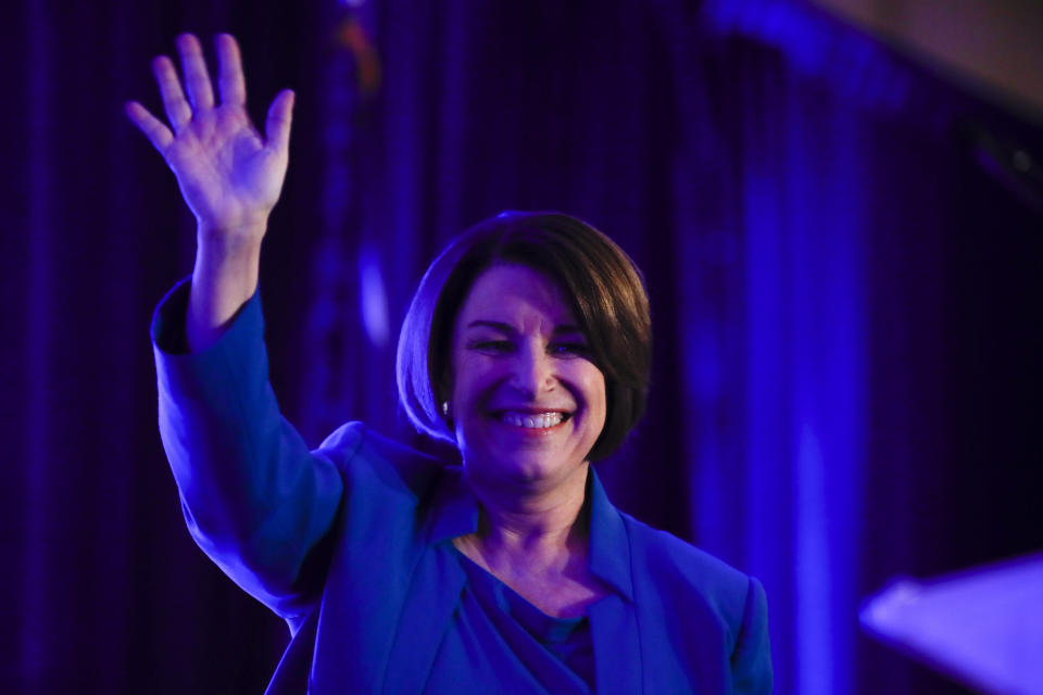 Democratic presidential candidate Sen. Amy Klobuchar, D-Minn walks onto the stage to speak at the First in the South Dinner, Monday, Feb. 24, 2020, in Charleston, S.C. (AP Photo/Matt Rourke)