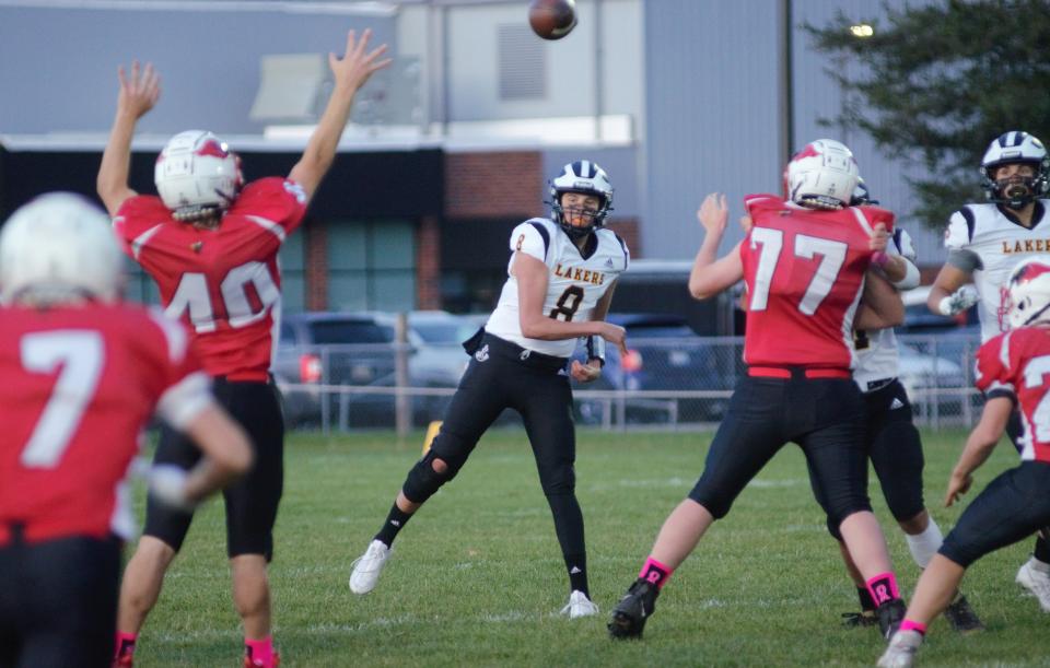 Keaton LaCross (8) throws a pass during Maple City Glen Lake's 47-6 victory over Johannesburg-Lewiston on Friday, Oct. 6.