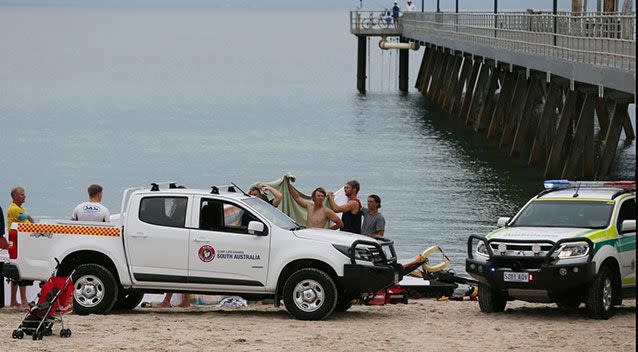 People are asked to swim at patrolled beaches, between the red and yellow flags, and heed any safety signs to minimise risks. Source: 7 News