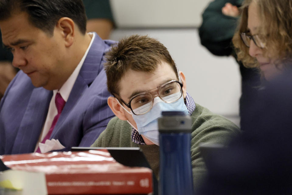 Marjory Stoneman Douglas High School shooter Nikolas Cruz listens to the proceedings during the Marjory Stoneman Douglas High School shooter Nikolas Cruz penalty phase of his trial at the Broward County Courthouse in Fort Lauderdale on Wednesday, July 20, 2022. Cruz previously plead guilty to all 17 counts of premeditated murder and 17 counts of attempted murder in the 2018 shootings. (Mike Stocker/South Florida Sun Sentinel via AP, Pool)