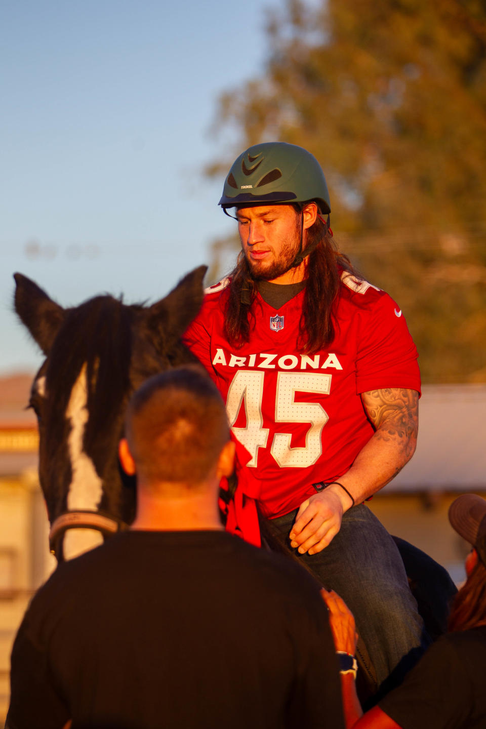 Dennis Gardeck rides a horse at Hunkapi Horse Farms in Scottsdale on Nov. 6, 2023.