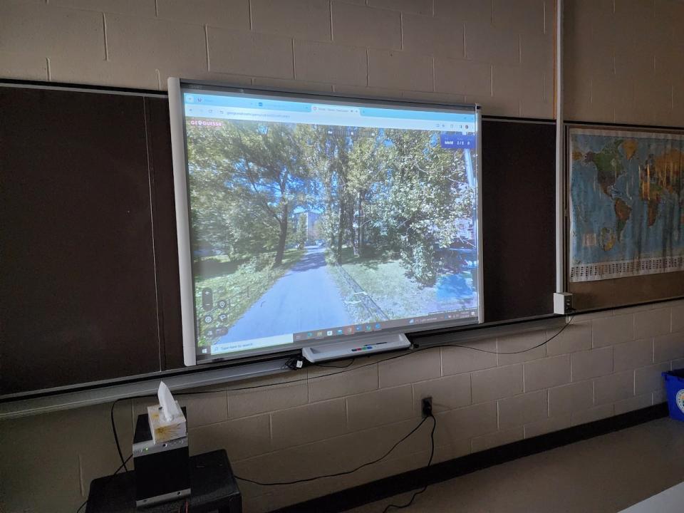 Adams will put the GeoGuessr location up on his classroom's smart board and students will join the game on their personal devices.