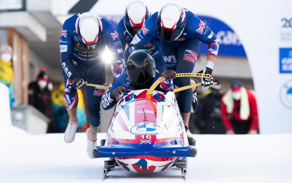 Lamin Deen of Great Britain and team in action during the Men's 4-Bob World Cup in St. Moritz, Switzerland,, on Sunday Jan. 16, 2022. - AP