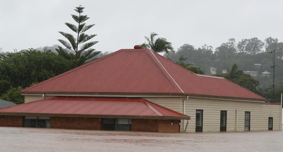 Flooding occurs in the town of Lismore, northeastern New South Wales, Monday, February 28, 2022. A severe weather warning is in place for southeast Queensland and areas in northern NSW as wild weather and dangerous flooding continues to severely impact large swathes of both states. (AAP Image/Jason O'Brien) NO ARCHIVING