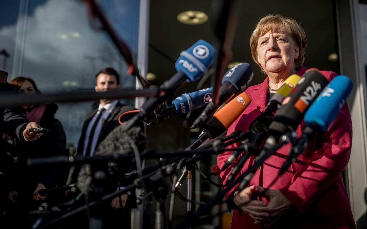 German Chancellor Angela Merkel gives a statement  - dpa