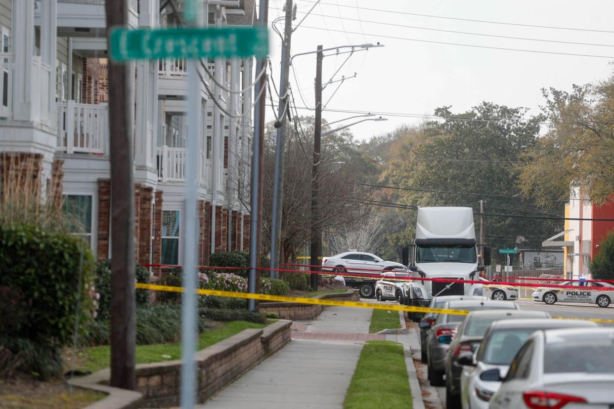 Red and yellow crime scene tape surrounds the area along Elgin Street near Savannah Gardens, where a Savannah High student was shot on Wednesday March 1, 2023 after leaving the school campus.