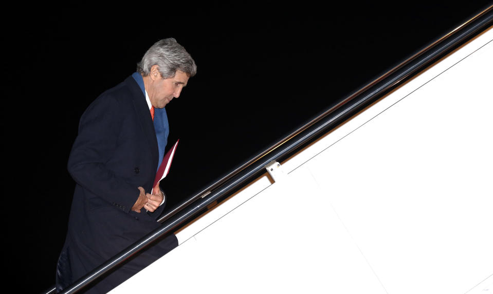 U.S. Secretary of State John Kerry departs Andrews Air Force Base, Md., en route to Ukraine, Monday, March 3, 2014. In remarks Monday, U.S. President Barack Obama said Kerry will propose ways in which a negotiation between Russia and Ukraine could be overseen by a multilateral organization when he goes to Kiev on Tuesday. (AP Photo/Kevin Lamarque, Pool)