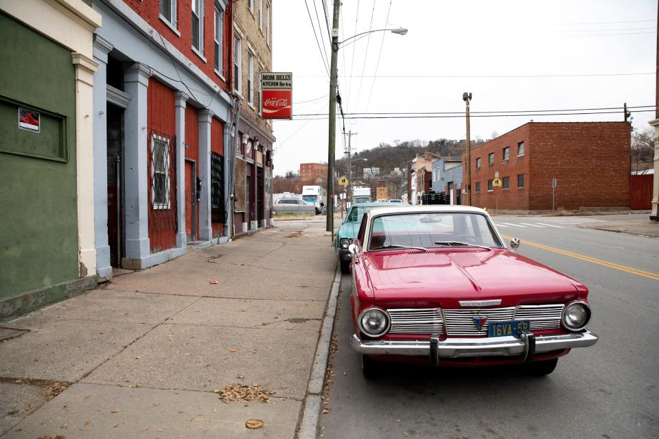 Old cars are parked in the West End where the Netflix movie "Shirley" was filmed. The movie tells the story of Shirley Chisholm, America’s first black congresswoman. “Shirley” is written and directed by Oscar-winning writer/director, John Ridley.