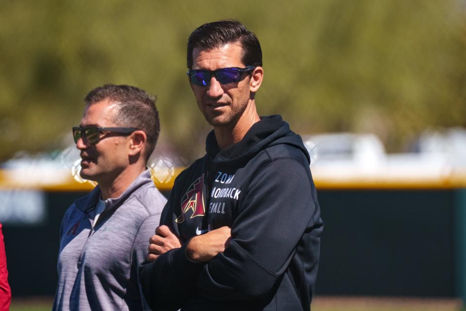 Diamondbacks general manager Mike Hazen (right) said he wants to add to the bullpen this off-season, looking for late-inning, power arms capable of missing bats.