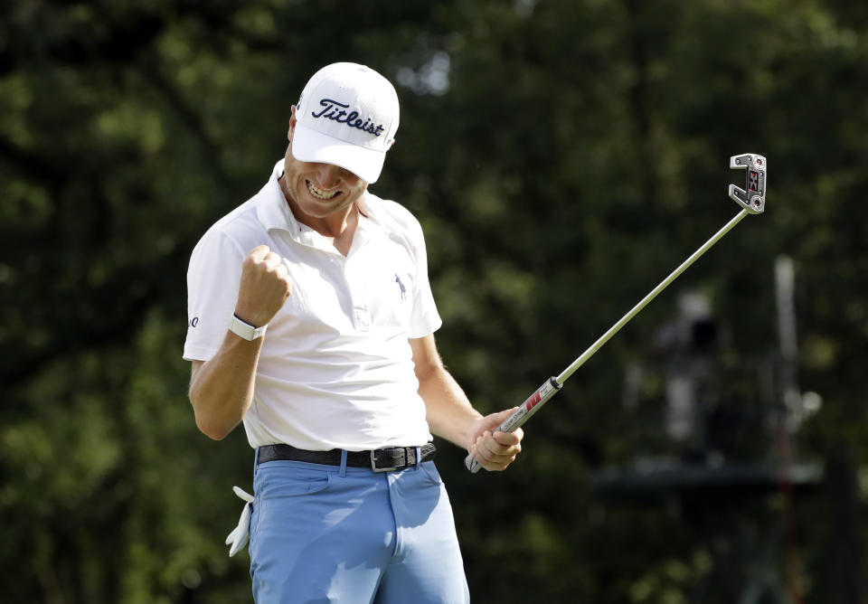 Justin Thomas celebrates after sinking a birdie on the 18th green during the final round at the BMW Championship golf tournament at Medinah Country Club, Sunday, Aug. 18, 2019, in Medinah, Ill. He finished under 25. (AP Photo/Nam Y. Huh)