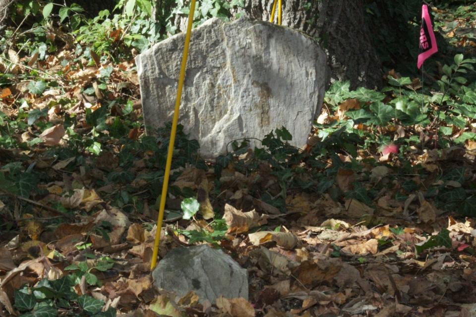 Ground penetrating radar found disturbances beneath the headstones but not below the parallel line of limestone slabs, indicating that they could be footstones.