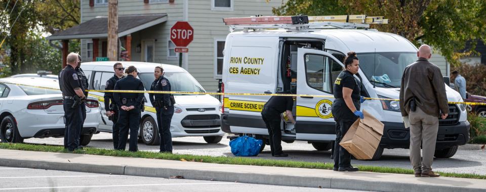 Authorities are at the scene of a shooting on the grounds of Edna Martin Christian Center and the KIPP:Indy High School on Friday, Nov. 3, 2023, in Indianapolis.