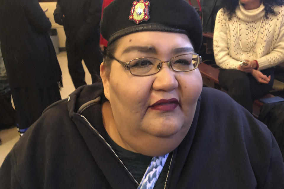 Joye Braun attends a hearing on a proposal to double the capacity of the Dakota Access pipeline on Wednesday, Nov. 13, 2019 in Linton, North Dakota. Braun, a community organizer with Indigenous Environmental Network and one of the leaders of the Dakota Access pipeline protest, says doubling the capacity of the pipeline also doubles the risk of an oil spill. (AP Photo/James MacPherson)