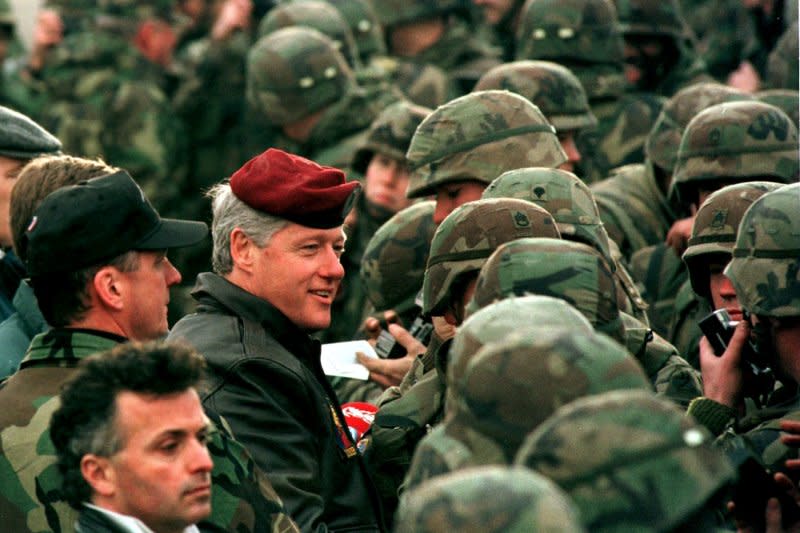 President Bill Clinton dons the red beret of the Red Eagles as he speaks with U.S. Troops stationed as part of a NATO peacekeeping force on January 13, 1996, in Tuzla, Bosnia. On April 4, 1949, representatives of 12 nations gathered in Washington to sign the North Atlantic Treaty, creating the NATO alliance. File Photo by Mike Marucci/UPI