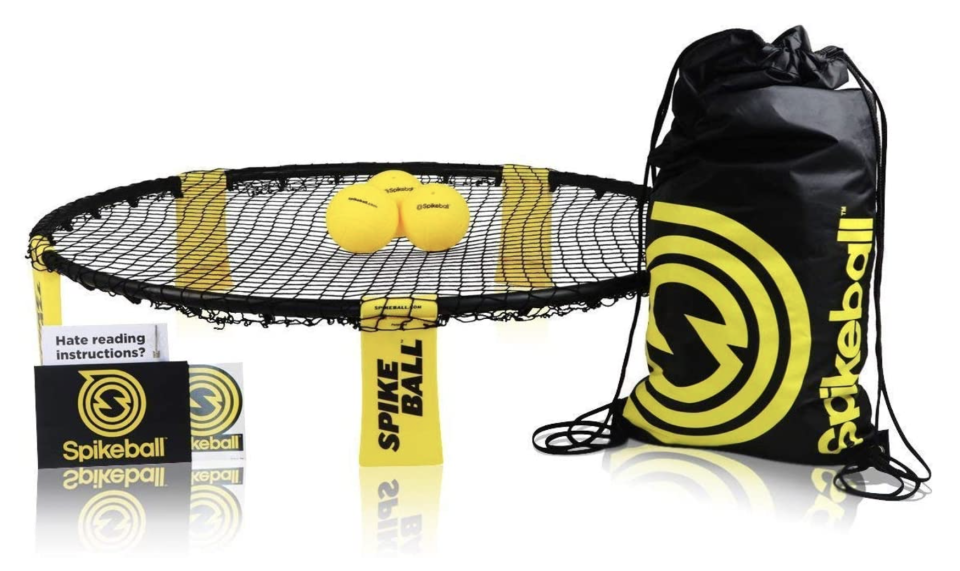 Spikeball Game Set (3 Ball Kit) with mini trampoline, yellow balls and black bag (Photo via Amazon)