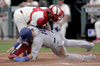 CORRECTS TO ROYALS CATCHER MJ MELENDEZ NOT SALVADOR PEREZ - Los Angeles Dodgers' Justin Turner (10) is forced out at home by Kansas City Royals catcher MJ Melendez as he tried to score on a double play hit into by Cody Bellinger during the first inning of a baseball game Saturday, Aug. 13, 2022, in Kansas City, Mo. (AP Photo/Charlie Riedel)