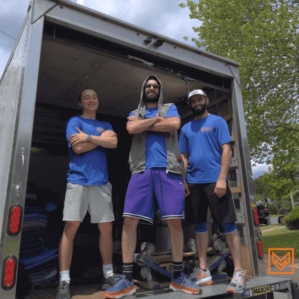 Three staff working for Vector Moving