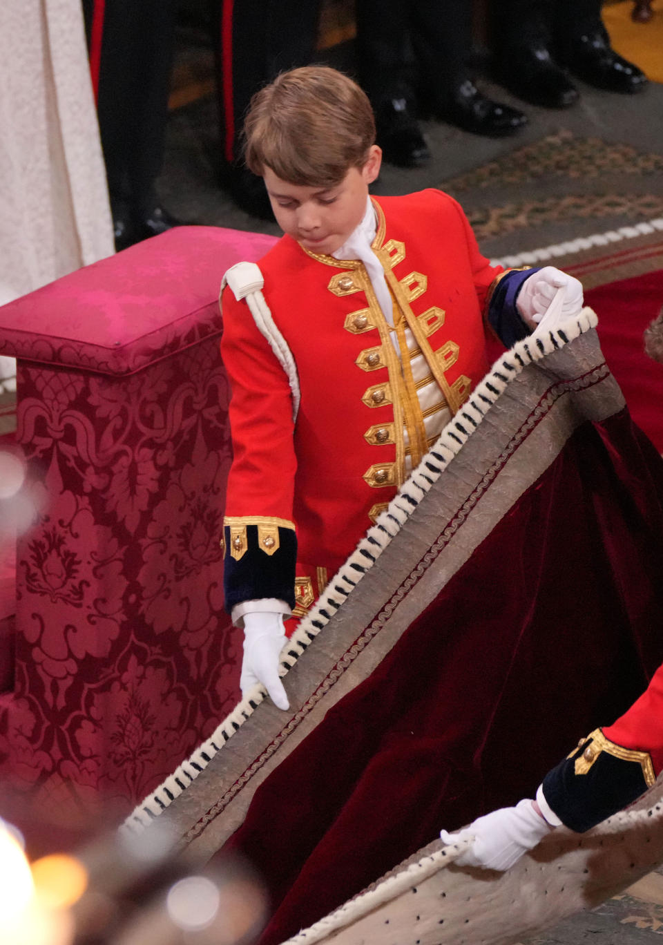 LONDON, ENGLAND - MAY 06: Prince George attends the coronation of King Charles III and Queen Camilla at Westminster Abbey on May 6, 2023 in London, England. The Coronation of Charles III and his wife, Camilla, as King and Queen of the United Kingdom of Great Britain and Northern Ireland, and the other Commonwealth realms takes place at Westminster Abbey today. Charles acceded to the throne on 8 September 2022, upon the death of his mother, Elizabeth II. (Photo by Aaron Chown  - WPA Pool/Getty Images)