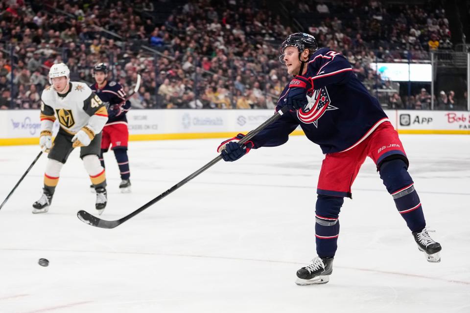 Mar 4, 2024; Columbus, Ohio, USA; Columbus Blue Jackets defenseman Adam Boqvist (27) shoots during the third period of the NHL hockey game against the Vegas Golden Knights at Nationwide Arena. The Blue Jackets won 6-3.