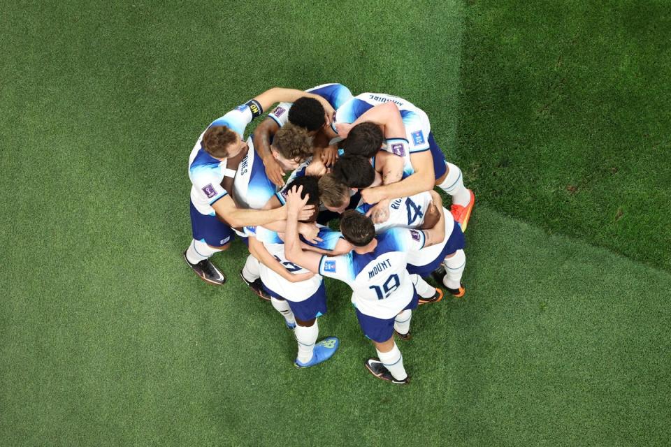 England players huddle after scoring their second (Getty)