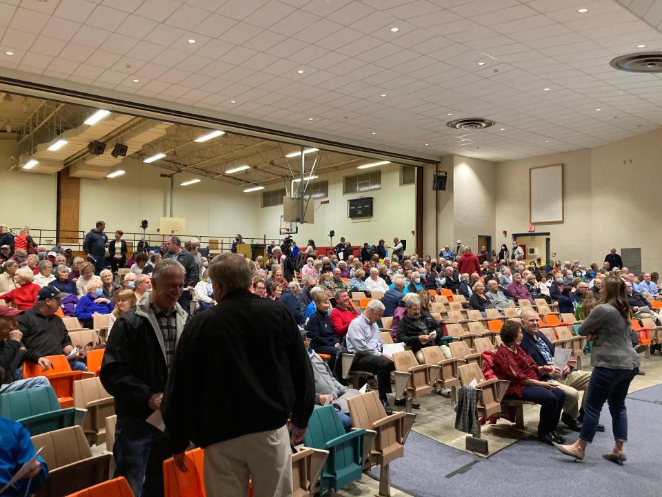 A special town meeting was held in Dennis last year. Town officials are seeing fewer people participate in civic engagement.