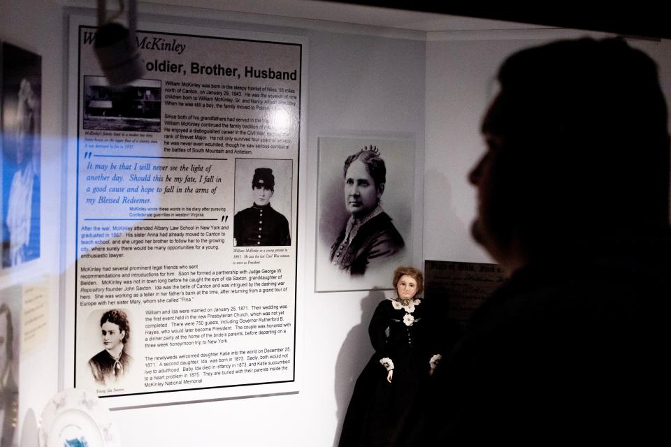 A visitor to the McKinley Presidential Library & Museum in Canton views a display in the McKinley Gallery.