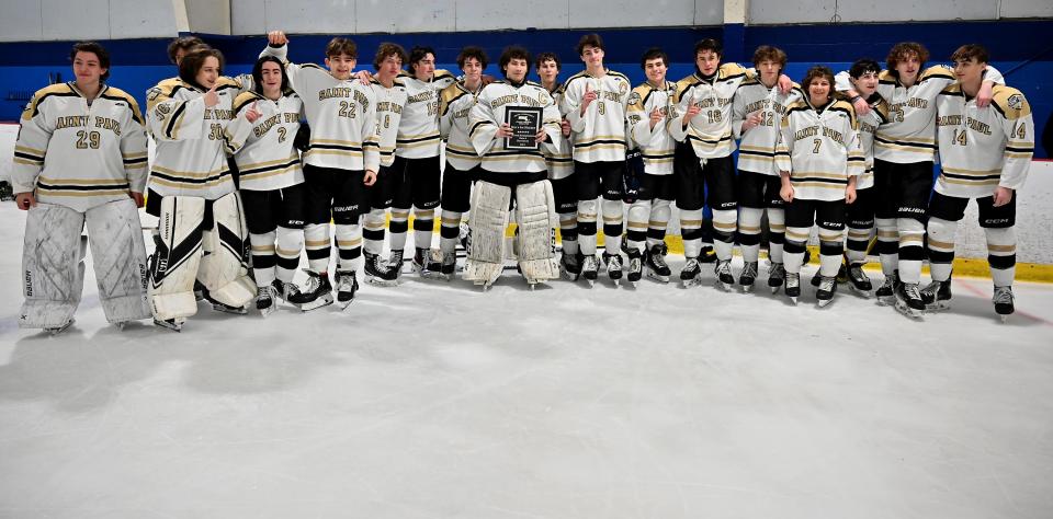 The St. Paul boys' hockey team collected the hardware at Thursday's Central Mass. Tournament Class A final.