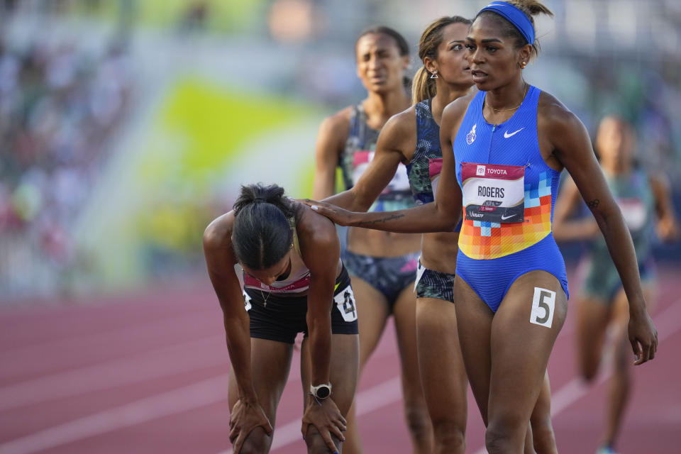 Nia Akins is congratulated by second place finisher Raevyn Rogers after winning the women's 800 meters final during the U.S. track and field championships in Eugene, Ore., Sunday, July 9, 2023. (AP Photo/Ashley Landis)