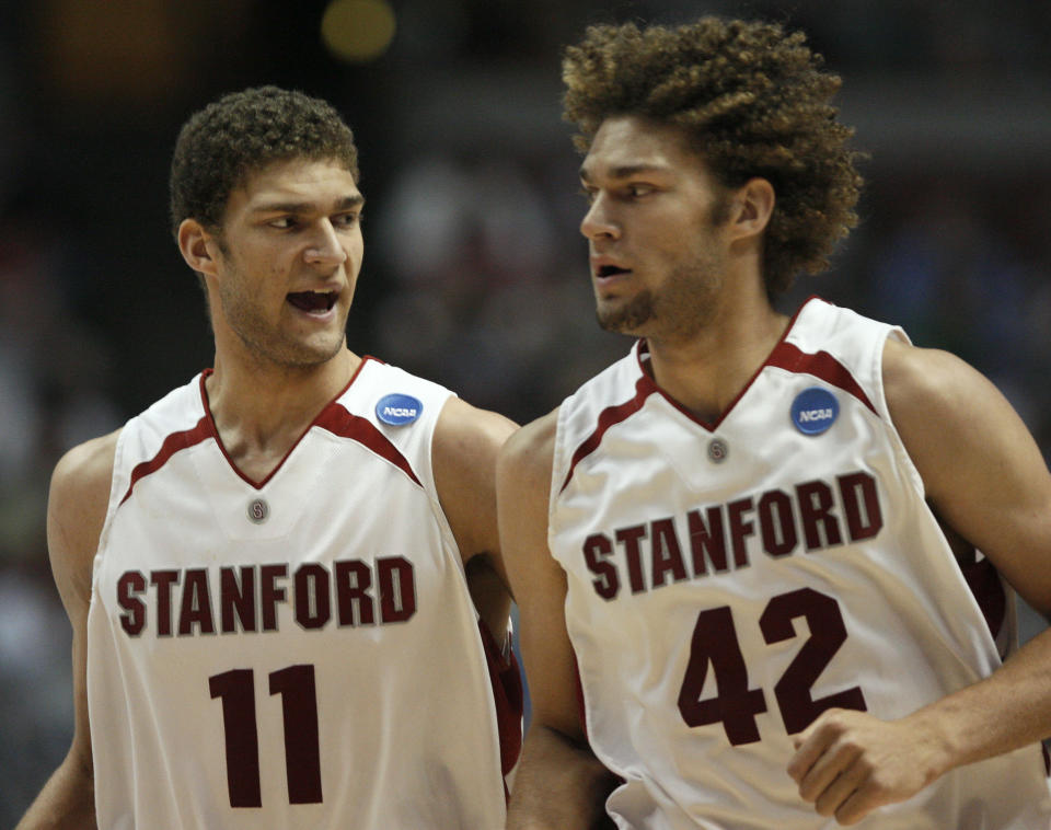 Brook Lopez, left, with twin brother, Robin, during Stanford's run at the 2008 NCAA tournament. (Lucy Nicholson/Reuters)