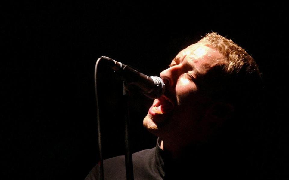 Chris Martin of Coldplay at Glastonbury in 2002 - Toby Melville/PA