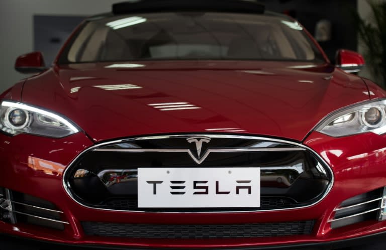 Tesla delivered 14,402 new vehicles in the quarter, with 9,764 of them being Model S sedans starting at $70,000