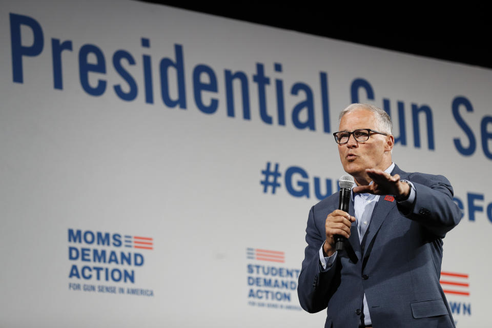 FILE - In this Aug. 10, 2019 file photo, Democratic presidential candidate Washington Gov. Jay Inslee speaks at the Presidential Gun Sense Forum in Des Moines, Iowa. Inslee, who made fighting climate change the central theme of his presidential campaign, announced Wednesday night, Aug. 21, 2019, that he is ending his bid for the 2020 Democratic nomination. (AP Photo/Charlie Neibergall, File)