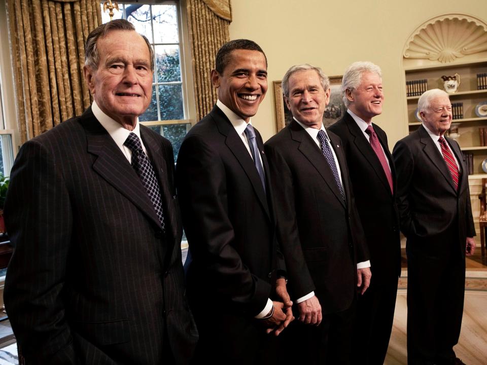 Former President George Bush, President-elect Barack Obama, President George W. Bush, former Presidents Bill Clinton, and Jimmy Carter.